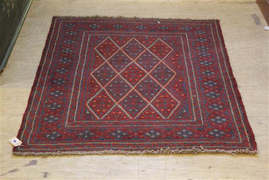 Persian red ground rug